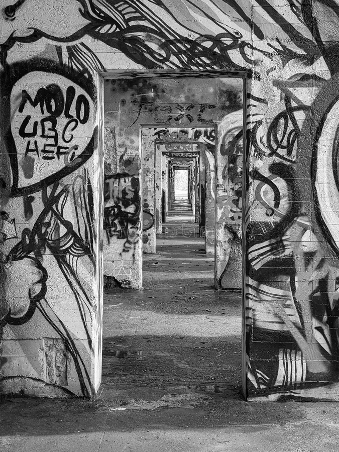 Graffiti covered tunnel opening